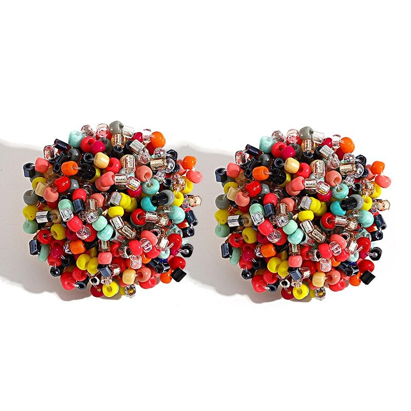 Norvo | Lys og morsom håndlaget multicolor perle pompom stud øredobber