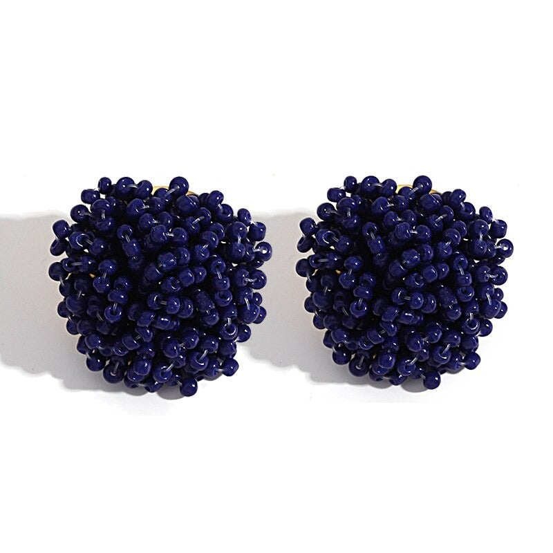 Norvo | Lys og morsom håndlaget multicolor perle pompom stud øredobber