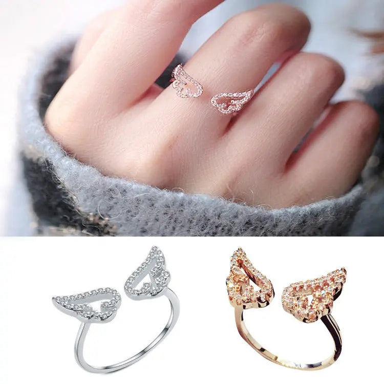 Norvo | Chic Angel Wings Ringer – Glam Tilbehør