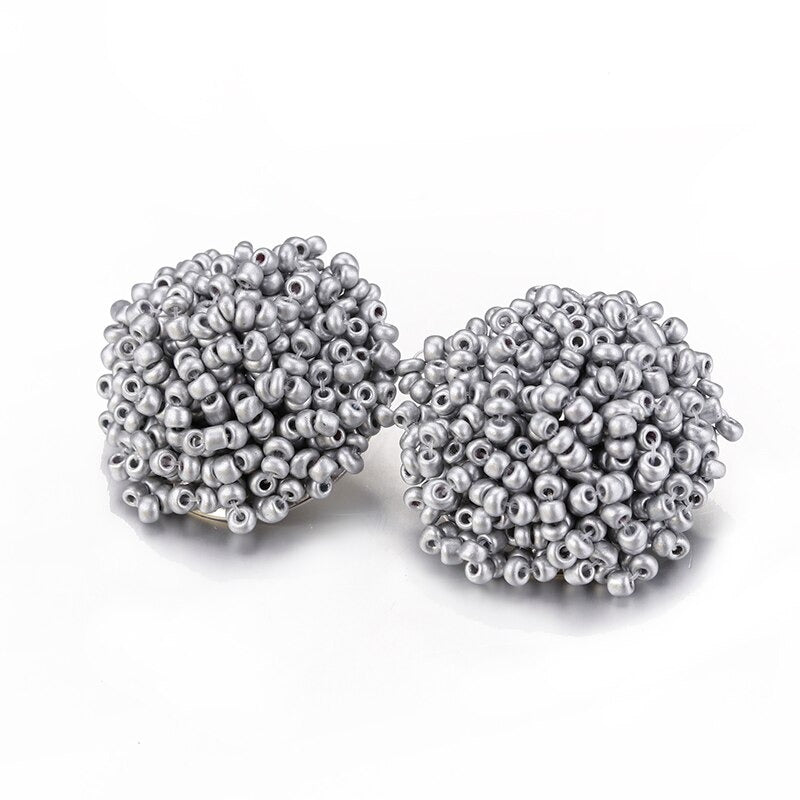 Norvo | Lys og morsom håndlaget multicolor perle pompom stud øredobber
