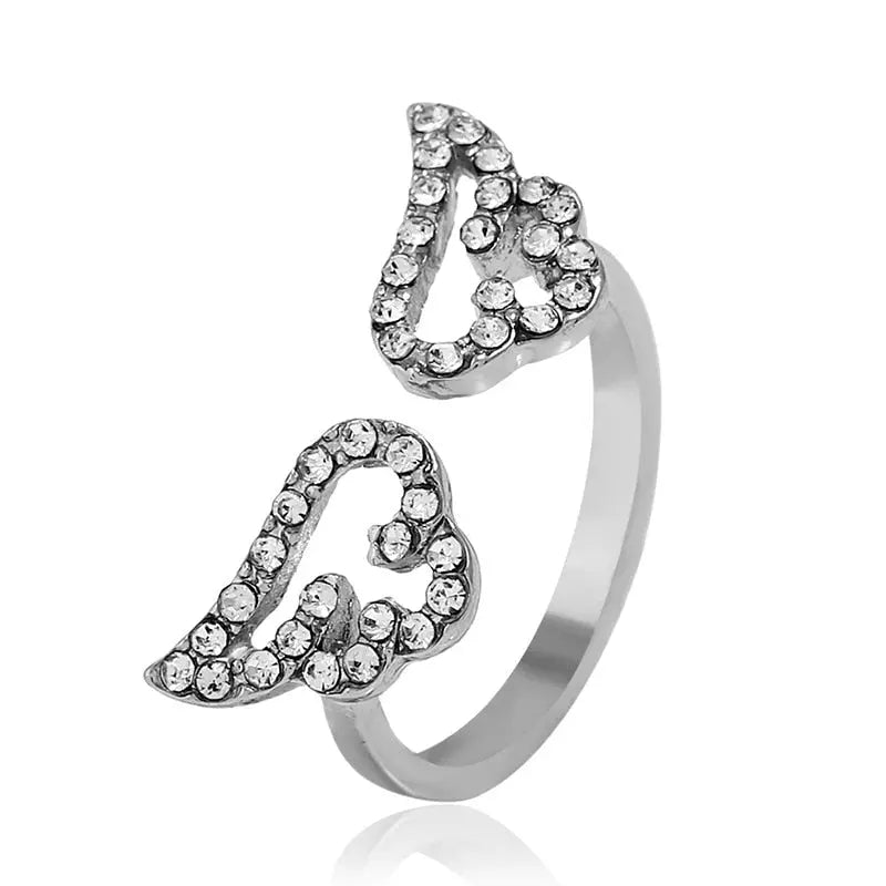 Norvo | Chic Angel Wings Ringer – Glam Tilbehør