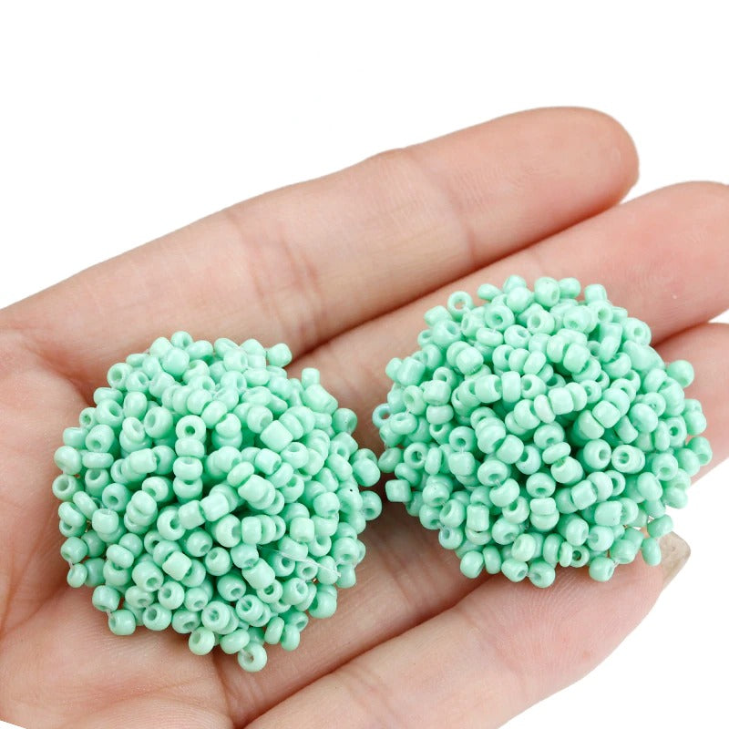 Norvo | Lys og morsom håndlaget multicolor perle pompom stud øredobber