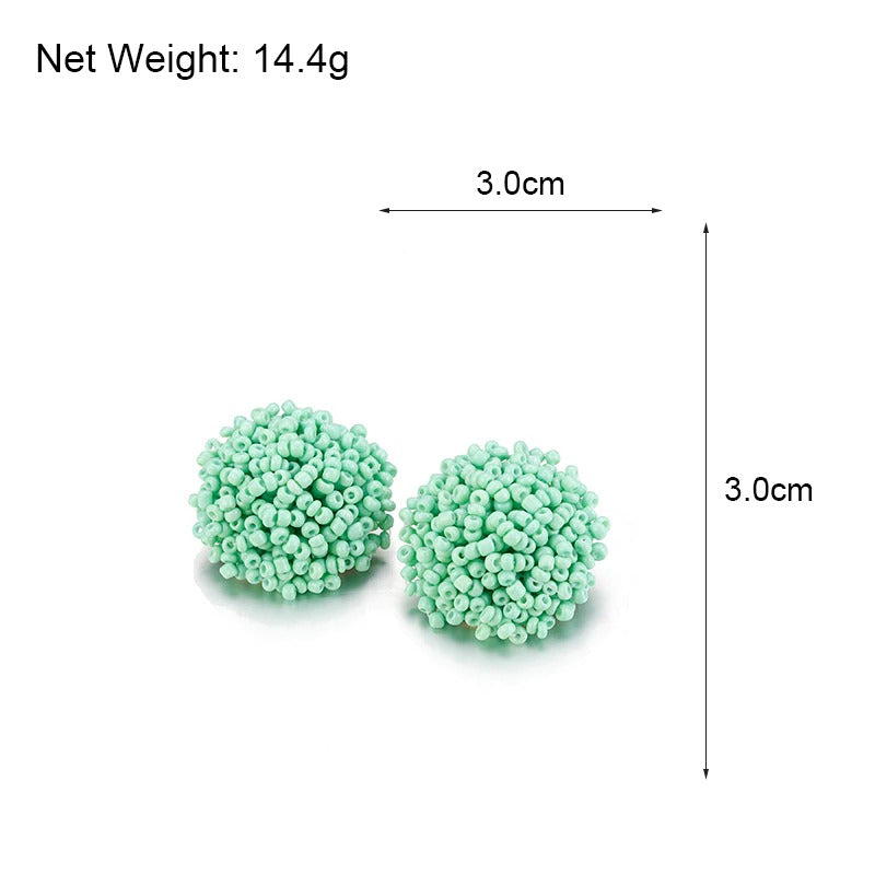 Norvo | Lys og morsom håndlaget multicolor perle pompom stud øredobber