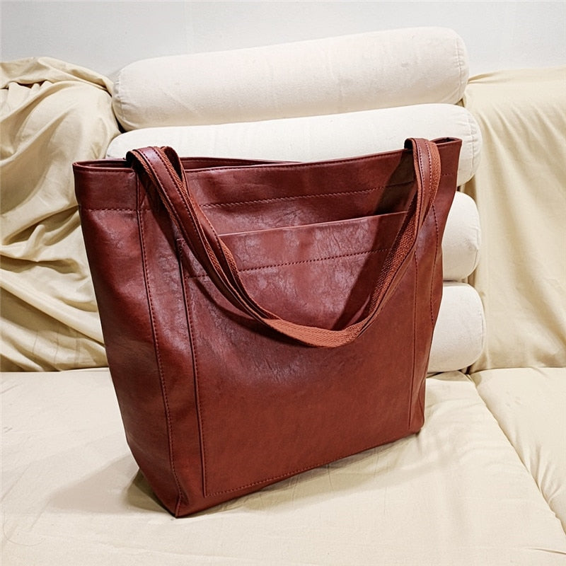 Skanto | Bær ikke bare en veske — Føl kraften av perfekt orden og tidløs stil overalt med deg!