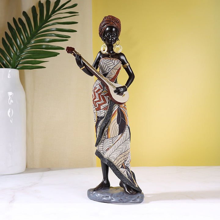 Skanto | Afrikansk kvinnelig musiker skulptur