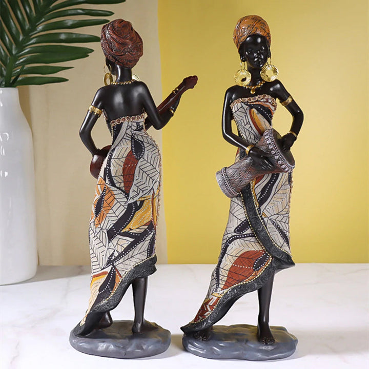 Skanto | Afrikansk kvinnelig musiker skulptur