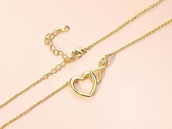 HeartBond Necklace – Tidløst Smykke av Knyttet Kjærlighet Skanto