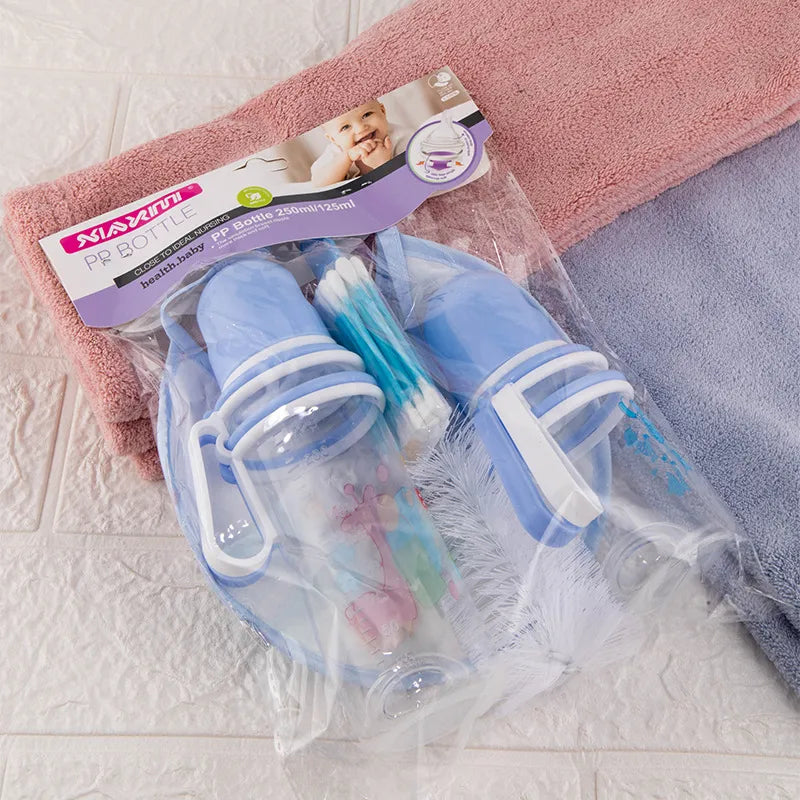 Norvo | Babypleiesett med flasker, smekker og rengjøringsbørste