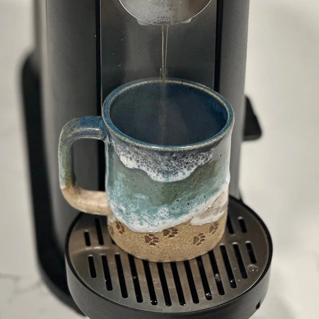 Skanto | Paw Print Ocean Shoreline Mug