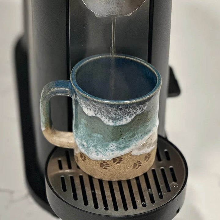 Skanto | Paw Print Ocean Shoreline Mug