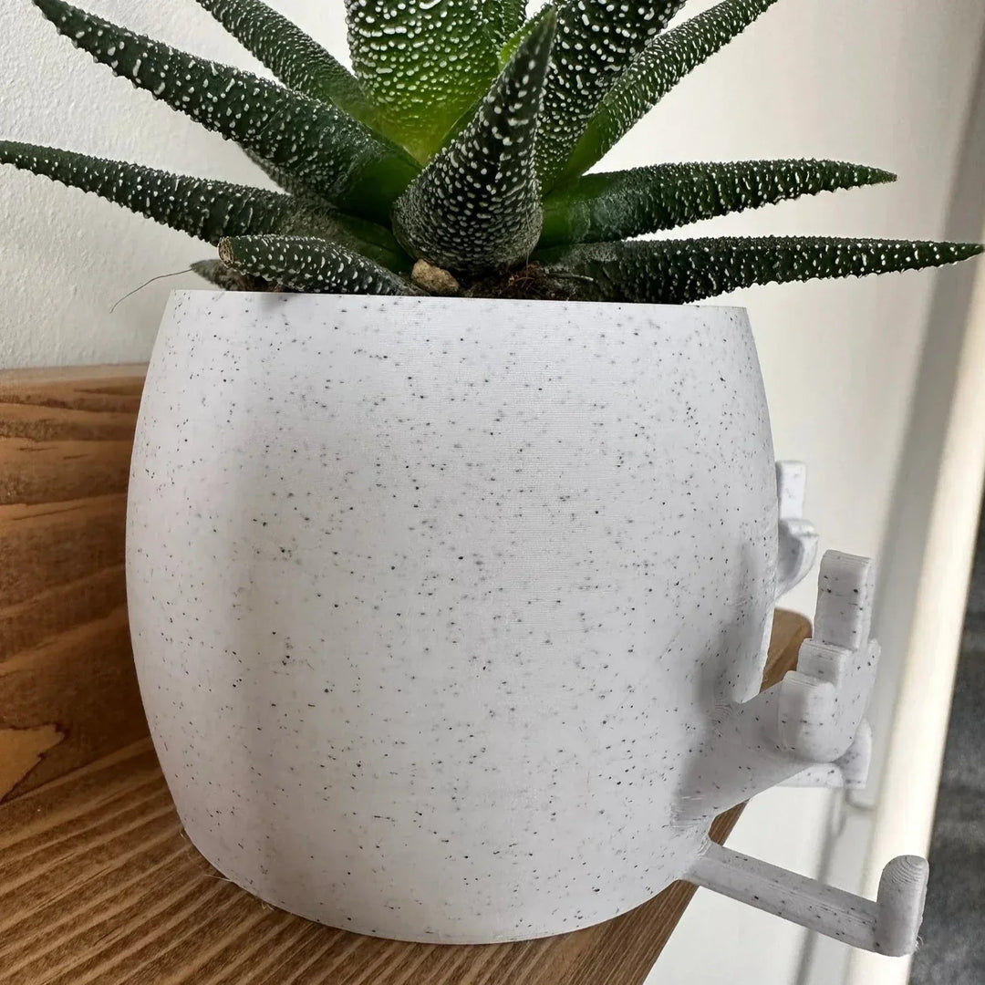 Skanto | Smilende Blomsterpotte med Midtfinger Opp