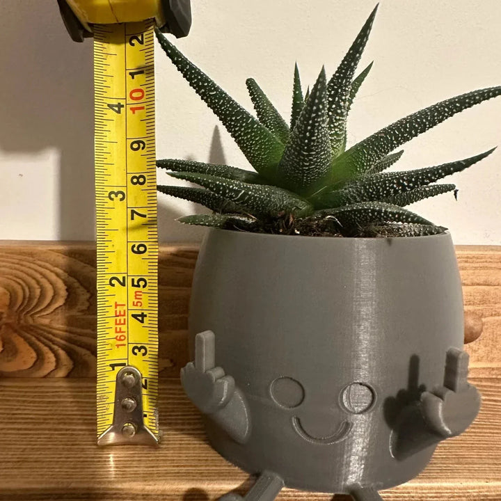 Skanto | Smilende Blomsterpotte med Midtfinger Opp