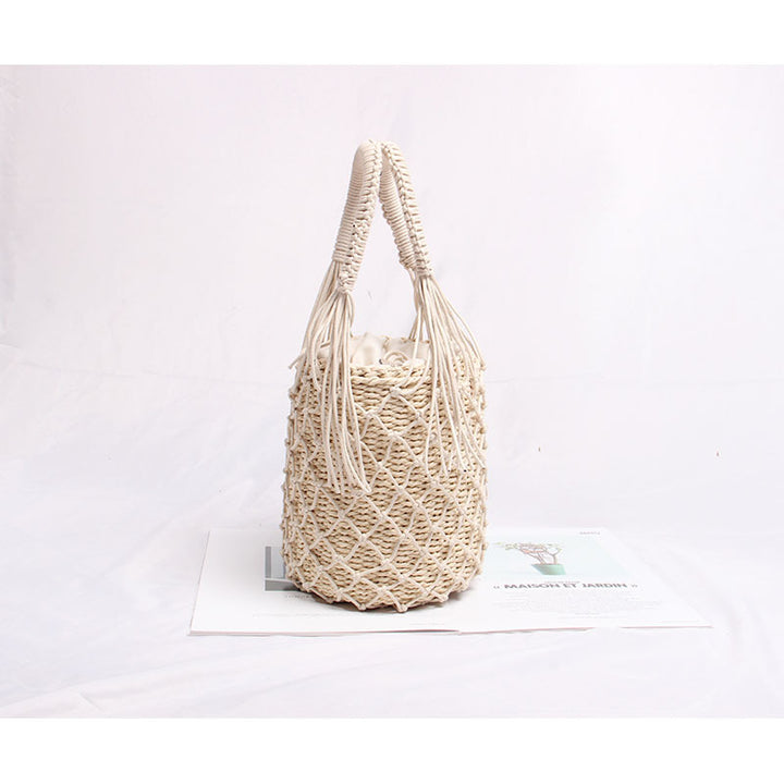 Braided macrame shoulder bag with decorative fringe Skanto