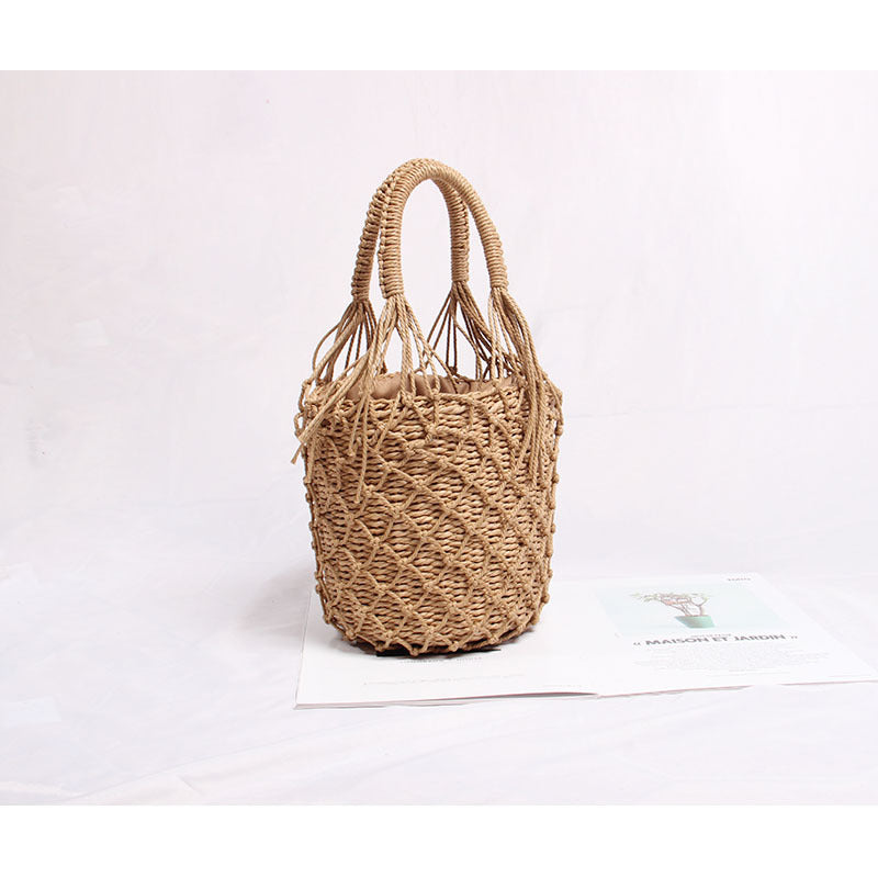 Braided macrame shoulder bag with decorative fringe Skanto