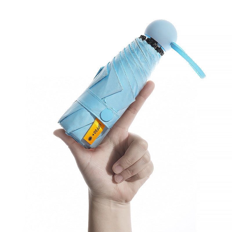 Dame kompakt UV-beskyttelse samfoldbar paraply med beskyttelsesdeksel Skanto