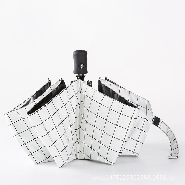 Dame faltparaply med elegant fjær-design Skanto