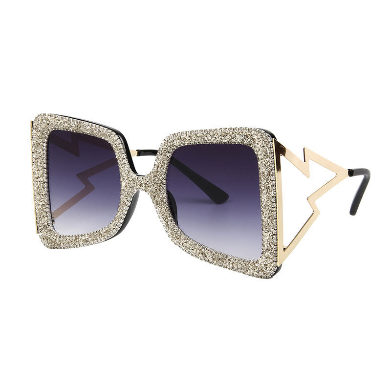 Dame overdimensjonert solbrille med glitrende krystallramme Skanto
