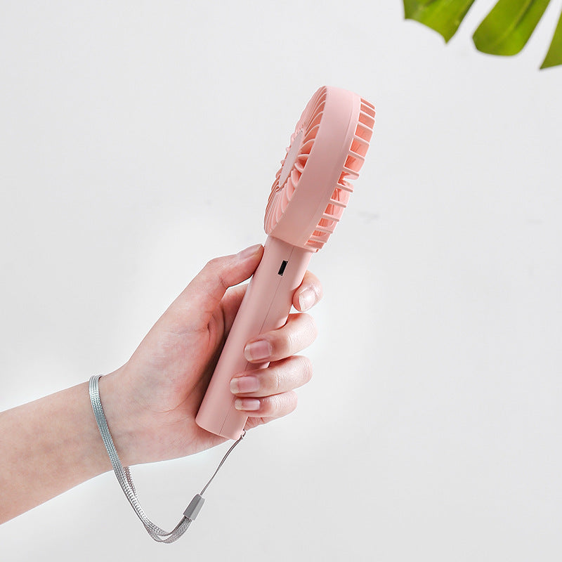 Unisex nan kompakt bærbar håndvifte med oppladbart batteri og USB ladeport stille drift frittstående Skanto