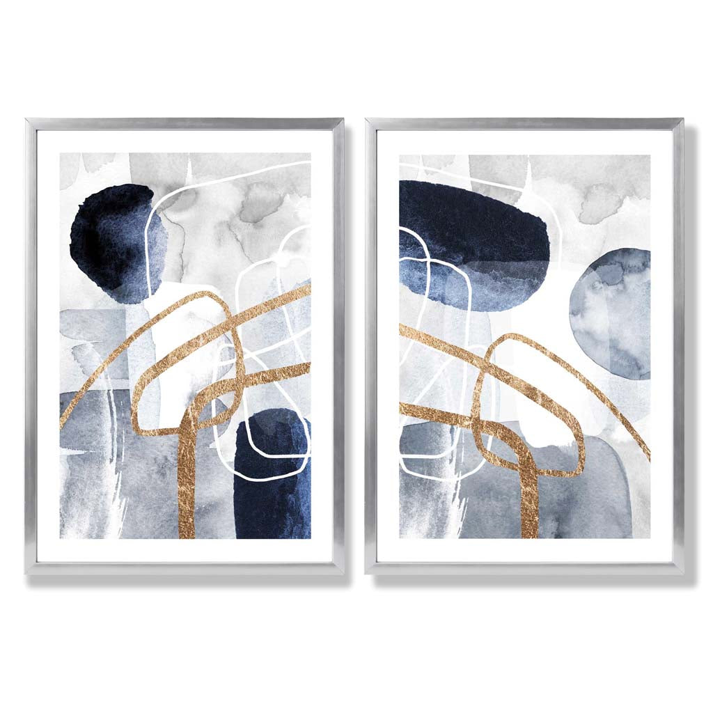 Sett med 2 kunsttrykk i abstrakt rammedesign i blått og gull