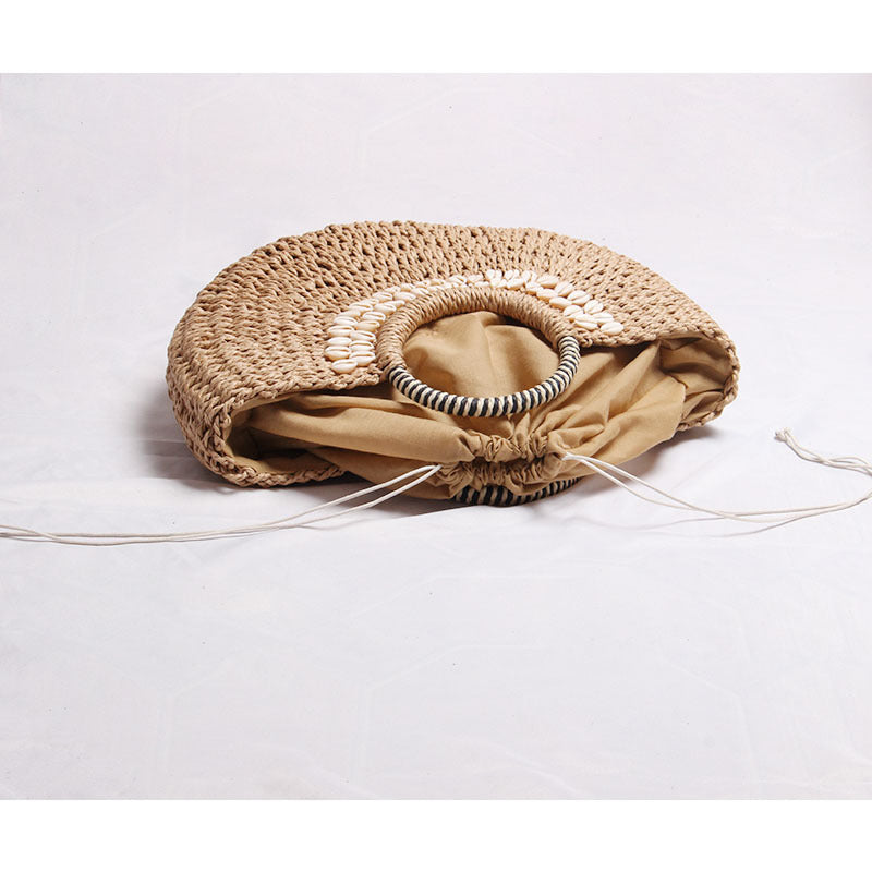 Elegant basket bag with shell decor Skanto