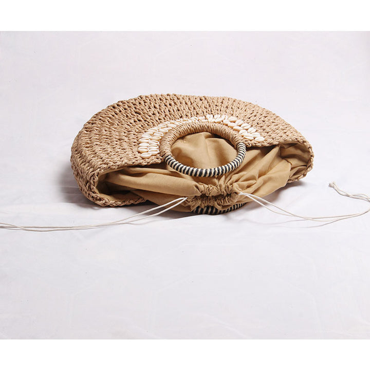 Elegant basket bag with shell decor Skanto