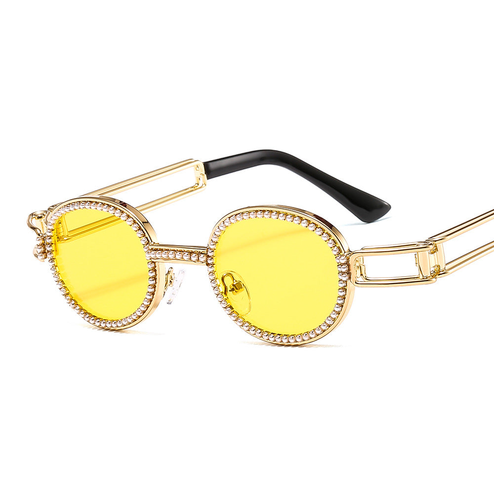 Dame moteriktig solbrille med glamorøs ramme Skanto