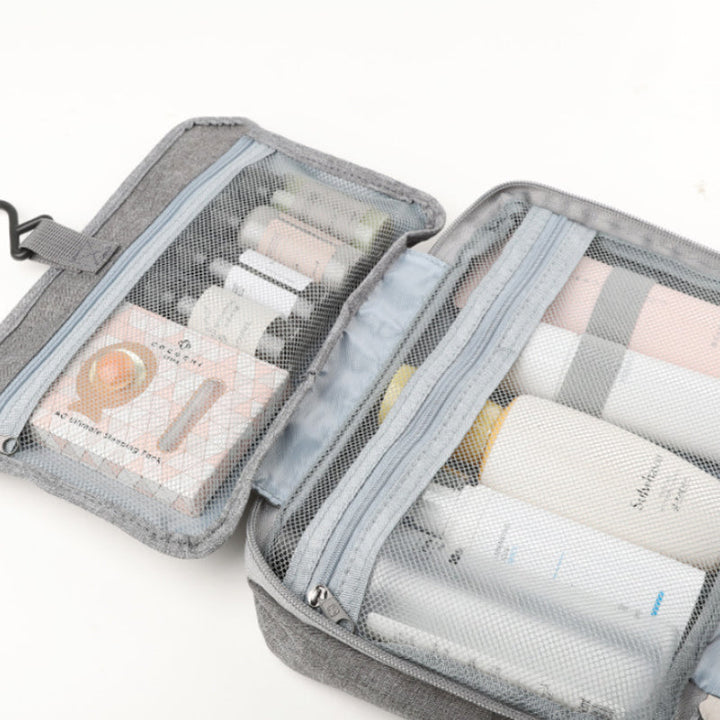 Skanto | Travelique Reiset kosmetikkorganisator | Kompakt & Vannavvisende | Med 4 Rom & 360° Hake | For Kvinner & Menn