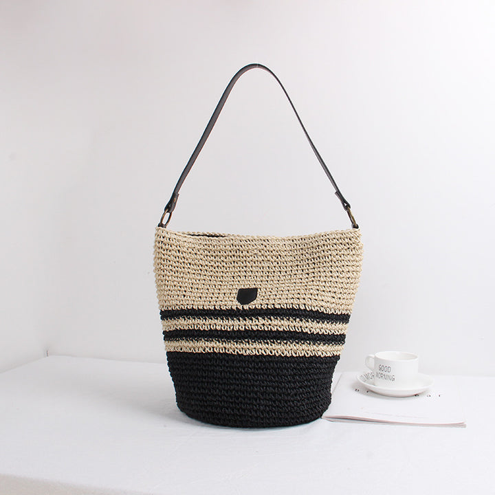 Braided shoulder bag with fashion accent Skanto