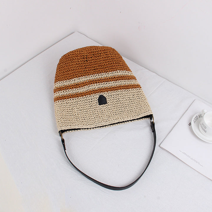 Braided shoulder bag with fashion accent Skanto