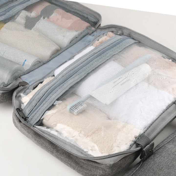 Skanto | Travelique Reiset kosmetikkorganisator | Kompakt & Vannavvisende | Med 4 Rom & 360° Hake | For Kvinner & Menn