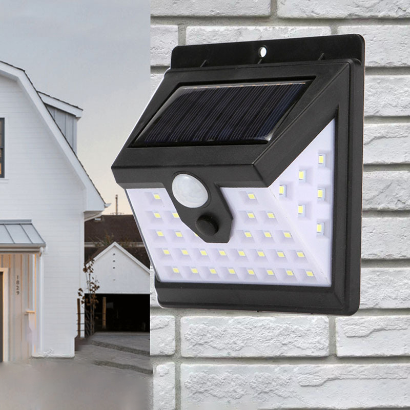 Soldrevet, vanntett, rektangulær LED-vegglampe med bevegelsessensor, laget av ABS, for terrassen