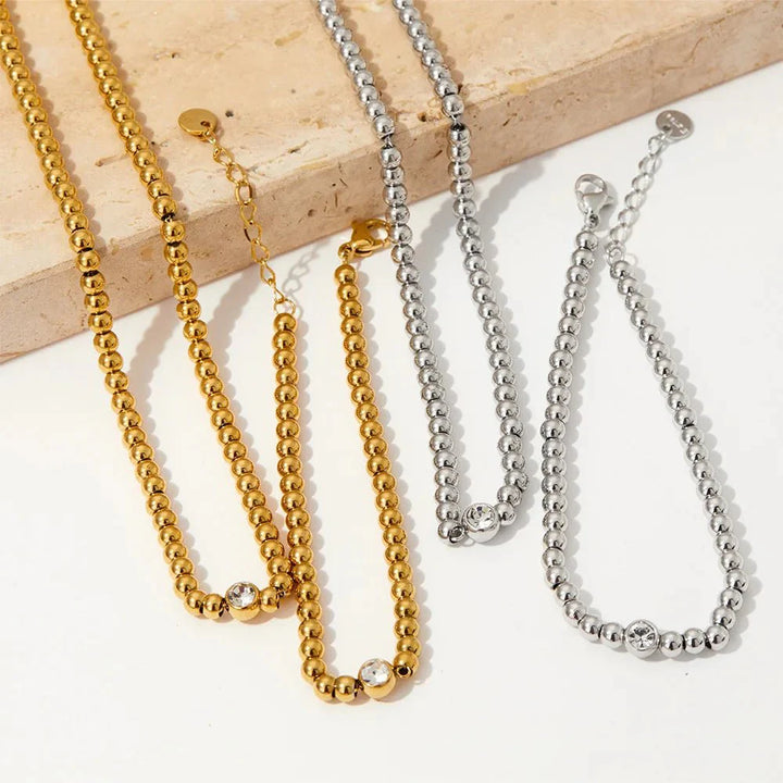 Skanto | 18k Perlede Diamant Senter Halssmykke og Armbånd