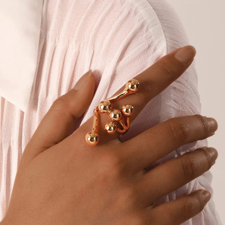 Skanto | 18k Bold Laget Kule Wrap Ring