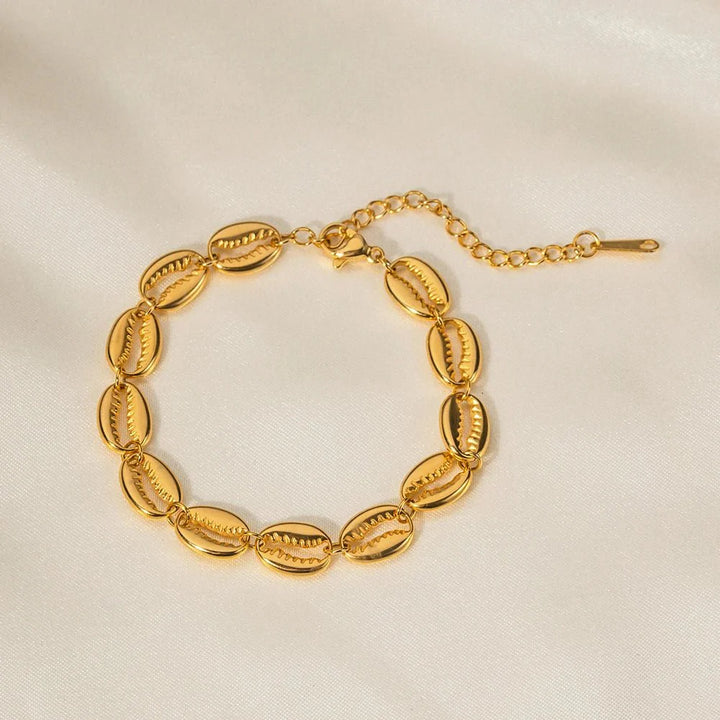Skanto | 18k Delikat Cowrie Shell Armbånd