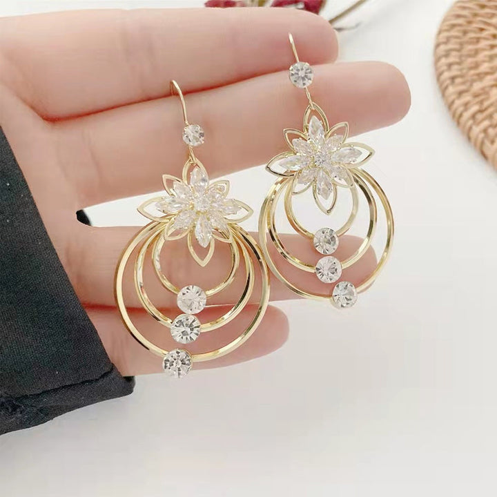 Crystal Lotus Tre Ringer Øredobber Skanto