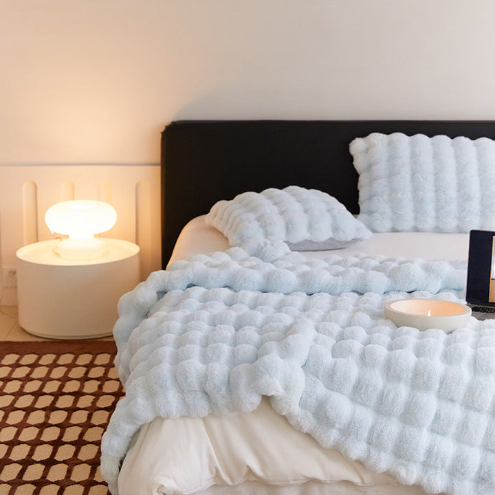 Plush falsk pels kastet for ultimate koselig varme | Skanto