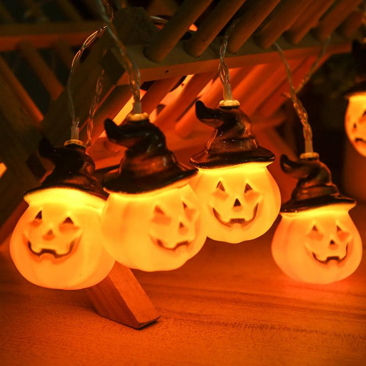 Strålende gresskar girlander Halloween med heksehatter | Skanto