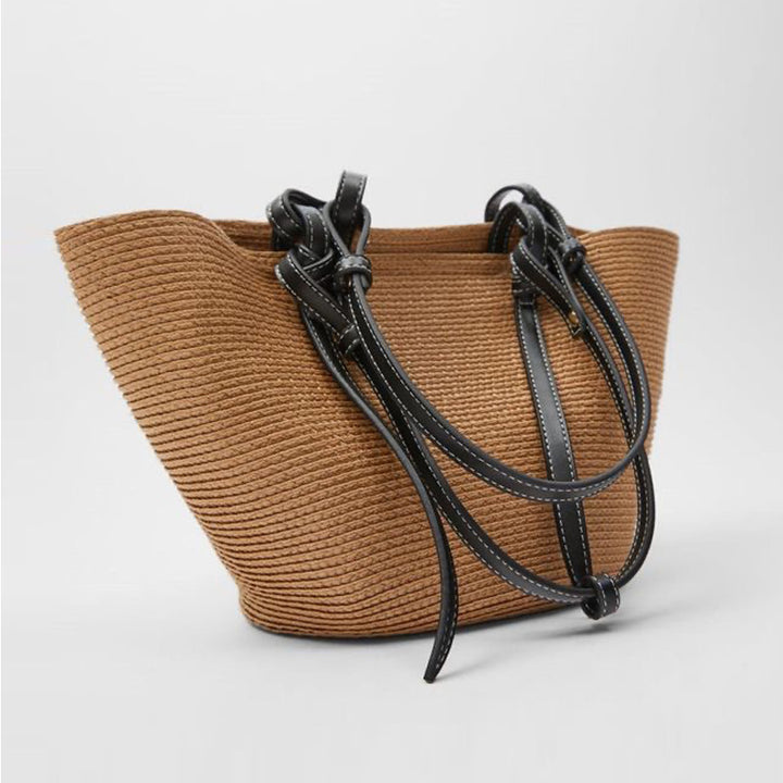 Spacious basket bag with elegant leather details Skanto
