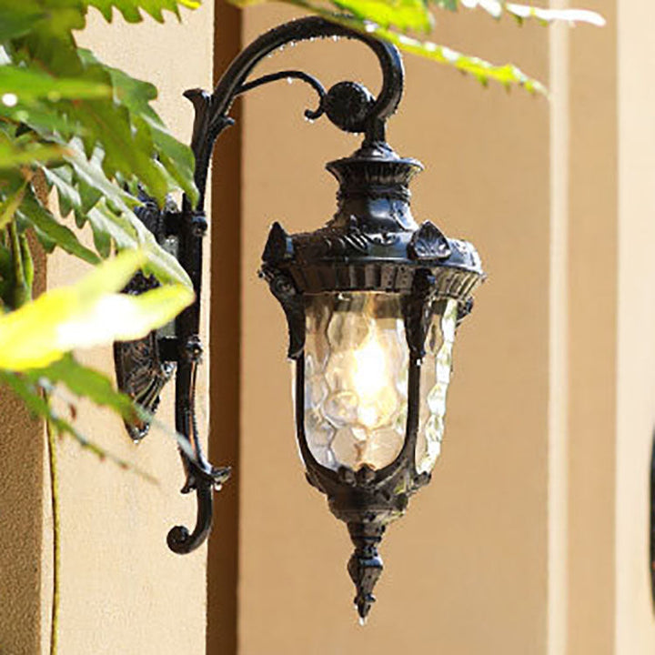 Tradisjonell europeisk sylinderlanterne aluminium glass 1-lys utendørs veggmontert lampe for utendørs patio | Skanto