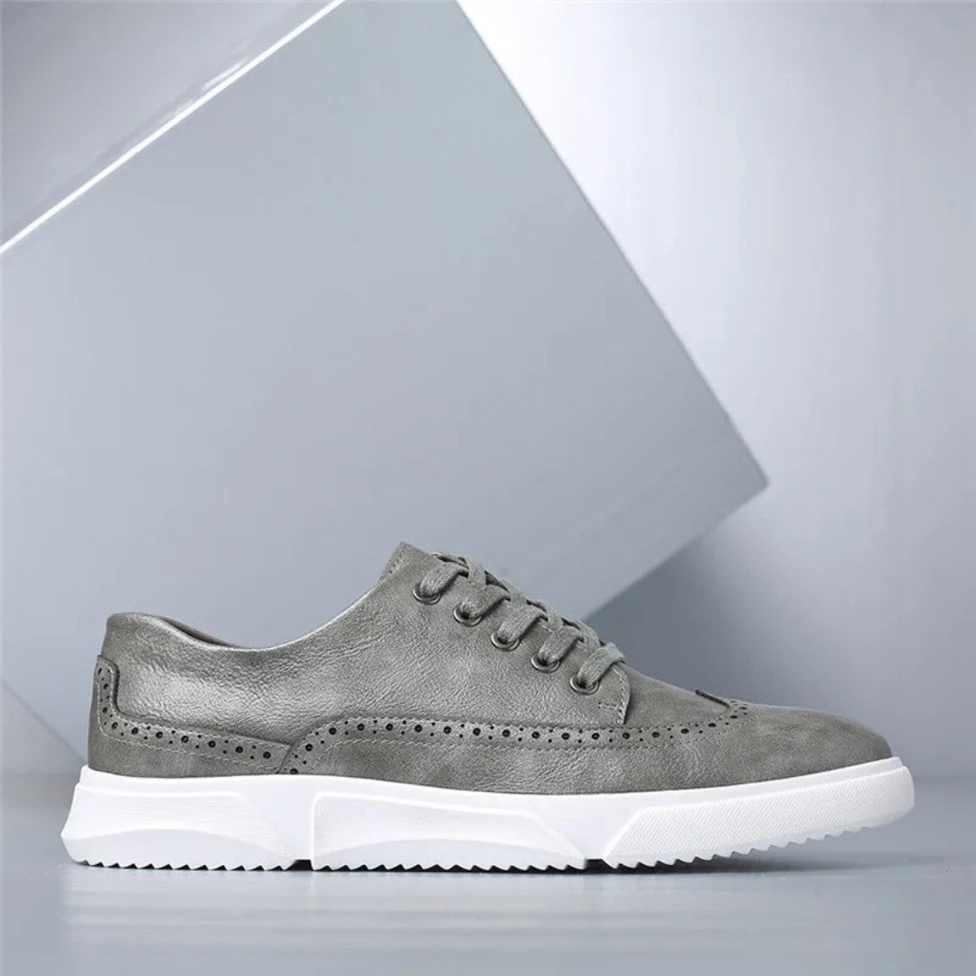 Brogue-sneakers i skinn med gummisåle