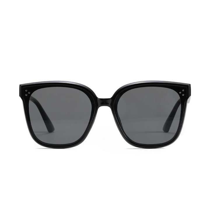Dame moteriktig solbrille med gjennomsiktig aksent Skanto
