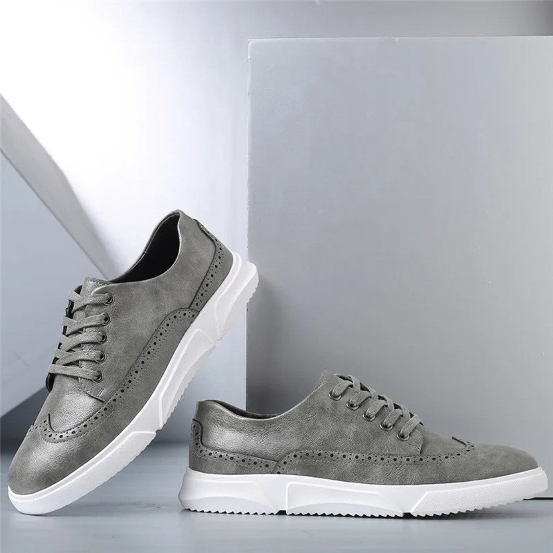 Brogue-sneakers i skinn med gummisåle