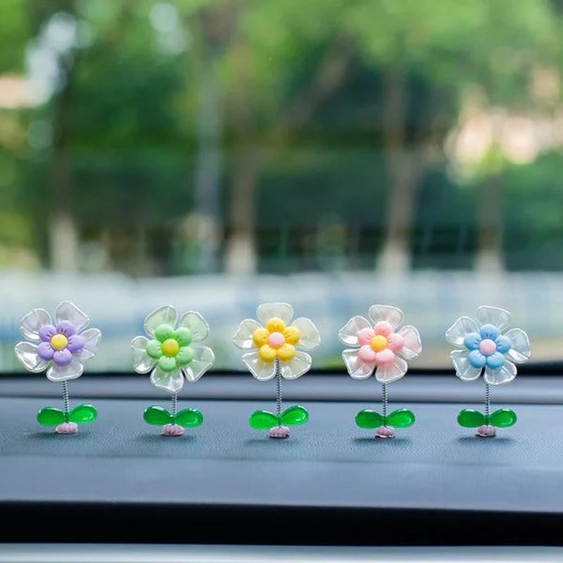 Skanto | Blomsterornamenter i bilen