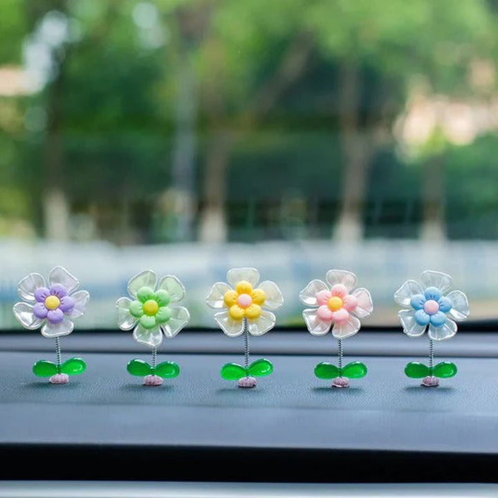 Skanto | Blomsterornamenter i bilen