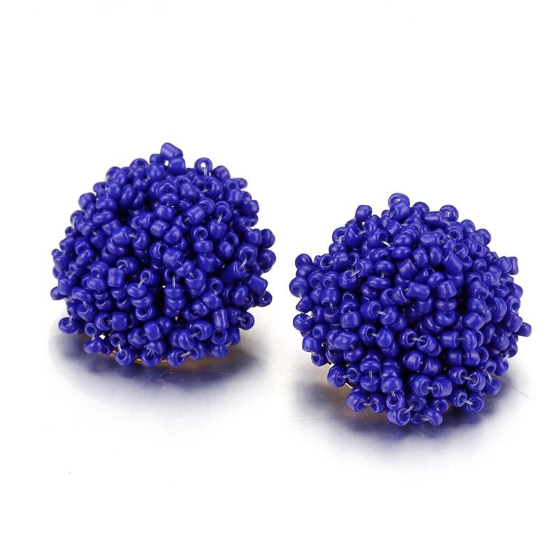 Skanto | Lys og morsom håndlaget multicolor perle pompom stud øredobber