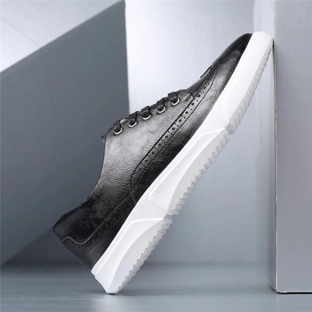 Brogue-sneakers i skinn med gummisåle