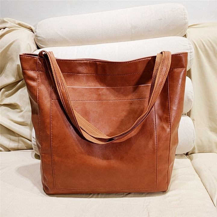 Skanto | Bær ikke bare en veske — Føl kraften av perfekt orden og tidløs stil overalt med deg!