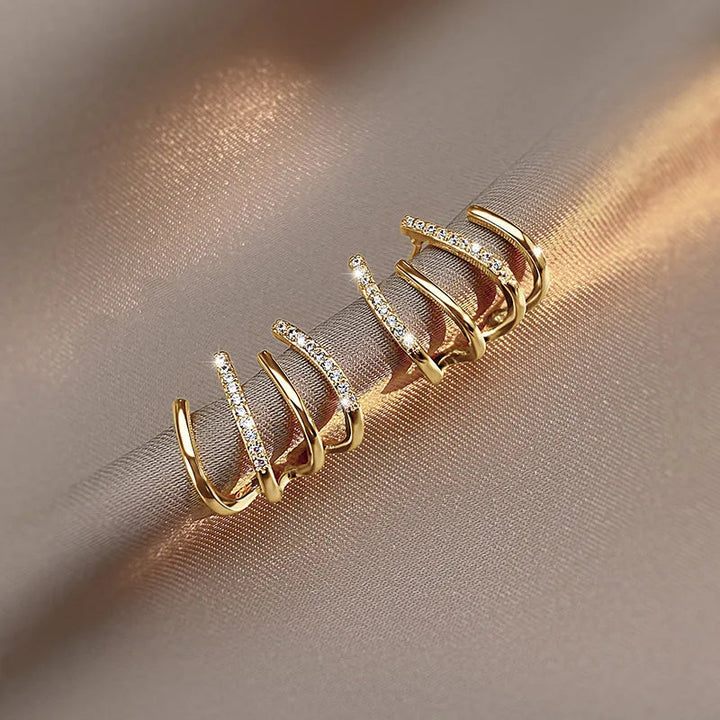 Skanto | Vridde Øredobber | Elegant Design | Gull eller Sølv