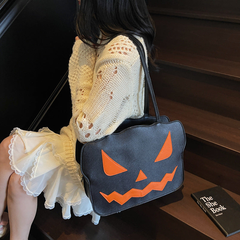 Skanto | Halloween Messenger Bag – Skulderveske i svart og oransje skummelt stil