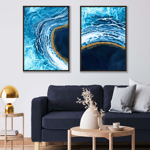 Abstrakt havmotiv i blått og gull, innrammet sett med 2 kunsttrykk med rammer